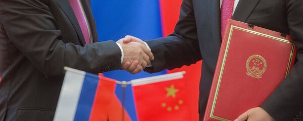 Заставе Русије и Кине Заставе Русије и Кине - Sputnik Србија