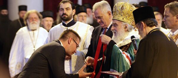 Бивши директор НИС-а Кирил Кравченко, патријарх српски Иринеј и председник Србије Томислав Николић током церемоније полагања првог камена мозаика у храму Светог Саве у Београду - Sputnik Србија