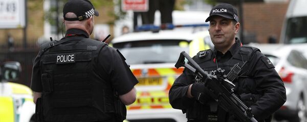 Припадници полиције у центру Лондона Припадници полиције у центру Лондона - Sputnik Србија