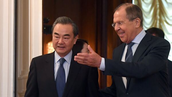 Ministar spoljnih poslova Rusije Sergej Lavrov i njegov kineski kolega Vang Ji - Sputnik Srbija