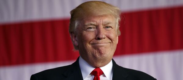 Trump smiles as he is introduced to speak to U.S. military troops and their families at Naval Air Station Sigonella, Saturday, May 27, 2017, in Sigonella, Italy. - Sputnik Србија