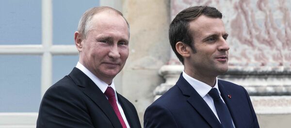 Председници Русије и Француске, Владимир Путин и Емануел Макрон - Sputnik Србија