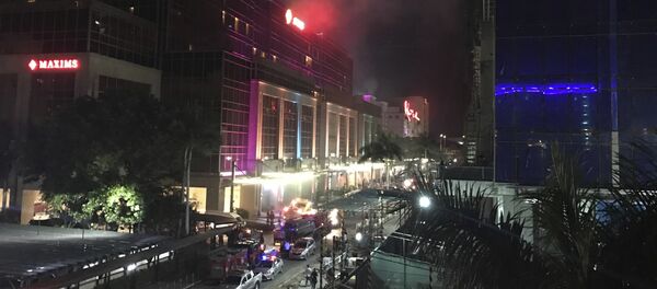 Дим се вије изнад одмаралишта Resorts World Manila на Филипинима Дим се вије изнад одмаралишта Resorts World Manila на Филипинима - Sputnik Србија