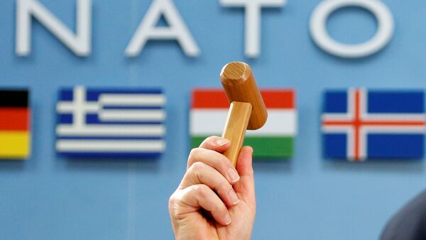 NATO Secretary-General Jens Stoltenberg holds up a ceremonial hammer at the start of a NATO-Georgia defence ministers meeting at the Alliance headquarters in Brussels, Belgium February 16, 2017. - Sputnik Srbija
