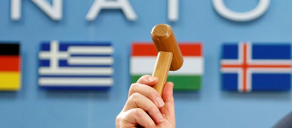 NATO Secretary-General Jens Stoltenberg holds up a ceremonial hammer at the start of a NATO-Georgia defence ministers meeting at the Alliance headquarters in Brussels, Belgium February 16, 2017. - Sputnik Србија