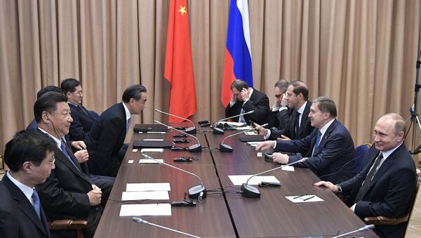 Predsednici Kine i Rusije Si Đinping i Vladimir Putin tokom sastanka u Astani - Sputnik Srbija
