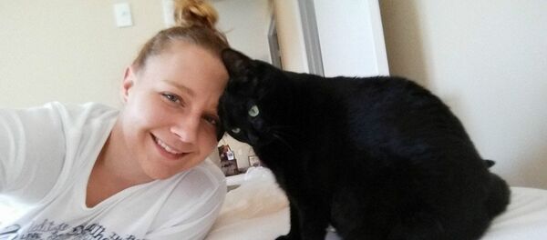 Reality Leigh Winner with her cat - Sputnik Србија