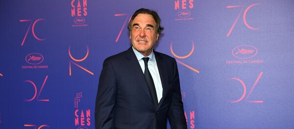 Амерички режисер Оливер Стоун на забави у част 70. годишњице Међународног филмског фестивала у Кану. - Sputnik Србија