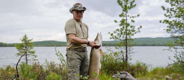 Председник Русије Владимир Путин на пецању у Краснојарском крају - Sputnik Србија