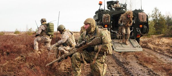 Амерички и летонски снајперисти током заједничких војних вежби у Летонији - Sputnik Србија