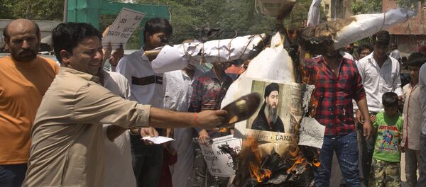Паљење слике вође ДАЕШ-а  Абу Бакр ел Багдадија - Sputnik Србија