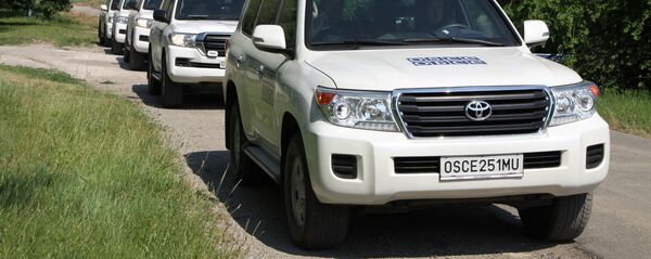 Конвој возила Специјалне посматрачке мисије ОЕБС-а у посети Донбасу - Sputnik Србија