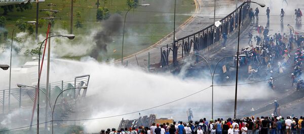 Демонстрације у Венецуели Демонстрације у Венецуели - Sputnik Србија