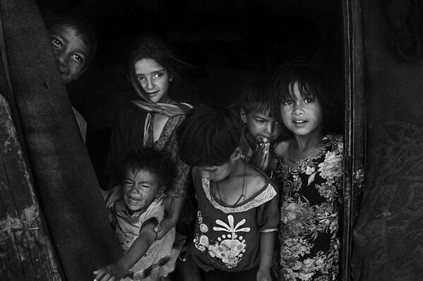„Неми крик“ – рад Шахневаза Хана из Бангладеша. Деца која живе у граду Леху у Индији. - Sputnik Србија