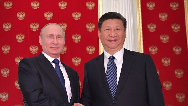 Председници Русије и Кине Владимир Путин и Си Ђинпинг - Sputnik Србија