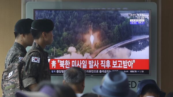 Праћење лансирања ракете на телевизији у Северној Кореји - Sputnik Србија