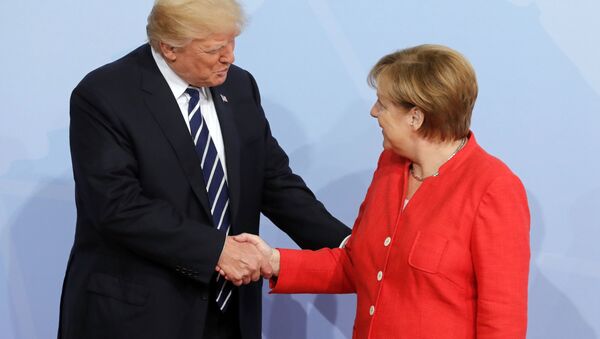 Председник САД Доналд Трамп и немачка канцеларка Ангела Меркел на почетку самита Г20 у Хамбургу - Sputnik Србија