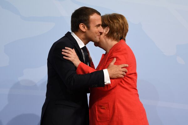 Nemačka kancelarka Angela Merkel i predsednik Francuske Emanuel Makron na otvaranju samita G20 u Hamburgu - Sputnik Srbija