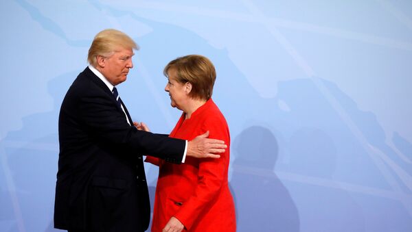 Немачка канцеларка Ангела Меркел и председник САД Доналд Трамп на отварању самита Г20 у Хамбургу - Sputnik Србија