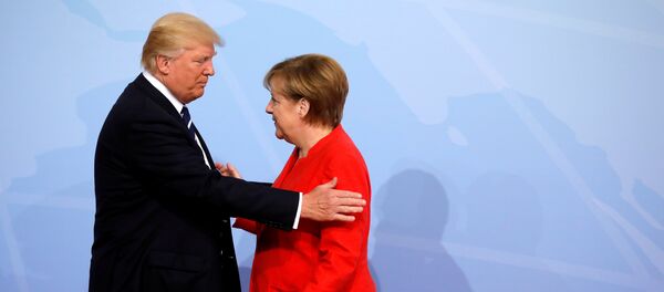 Немачка канцеларка Ангела Меркел и председник САД Доналд Трамп на отварању самита Г20 у Хамбургу Немачка канцеларка Ангела Меркел и председник САД Доналд Трамп на отварању самита Г20 у Хамбургу - Sputnik Србија