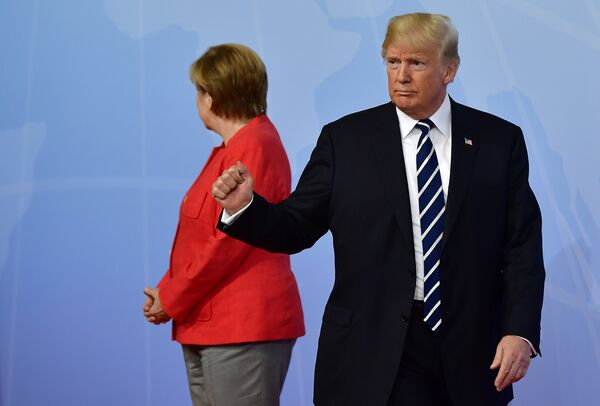 Немачка канцеларка Ангела Меркел и председник САД Доналд Трамп на отварању самита Г20 у Хамбургу Немачка канцеларка Ангела Меркел и председник САД Доналд Трамп на отварању самита Г20 у Хамбургу - Sputnik Србија