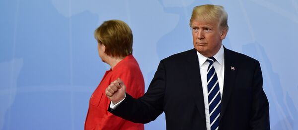 Немачка канцеларка Ангела Меркел и председник САД Доналд Трамп на отварању самита Г20 у Хамбургу - Sputnik Србија