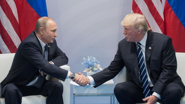 Председник Русије Владимир Путин и председник САД Доналд Трамп - Sputnik Србија