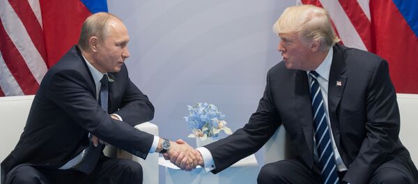 Predsednik Rusije Vladimir Putin i predsednik SAD Donald Tramp Predsednik Rusije Vladimir Putin i predsednik SAD Donald Tramp - Sputnik Srbija