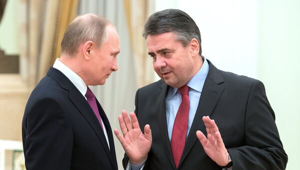 Ruski predsednik Vladimir Putin i nemački ministar inostranih poslova Zigmar Gabrijel - Sputnik Srbija