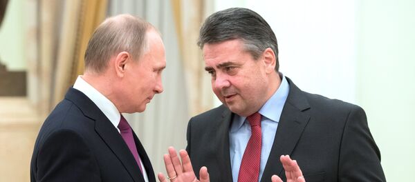 Ruski predsednik Vladimir Putin i nemački ministar inostranih poslova Zigmar Gabrijel - Sputnik Srbija