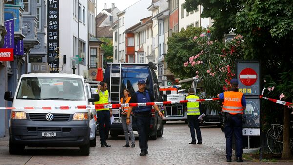 Полиција у швајцарском граду Шафхаузену после напада моторном тестером - Sputnik Србија