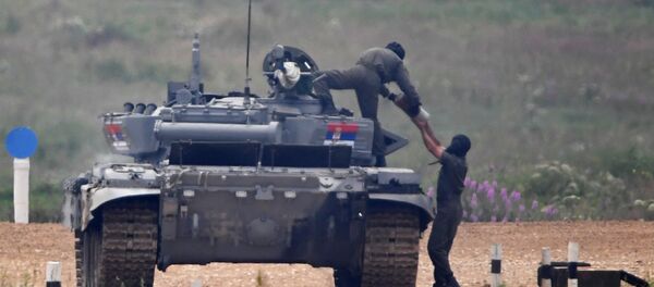 Припадници Војске Србије током прве етапе тенковског бијатлона у оквиру Војних игара 2017. на полигону Алабино Припадници Војске Србије током прве етапе тенковског бијатлона у оквиру Војних игара 2017. на полигону Алабино - Sputnik Србија