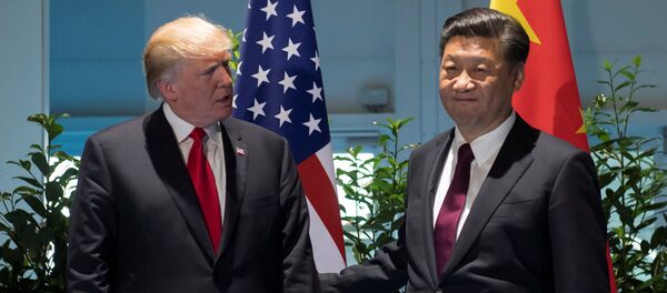 Председници САД и Кине Доналд Трамп и Си Ђинпинг на самиту Г20 у Хамбургу - Sputnik Србија