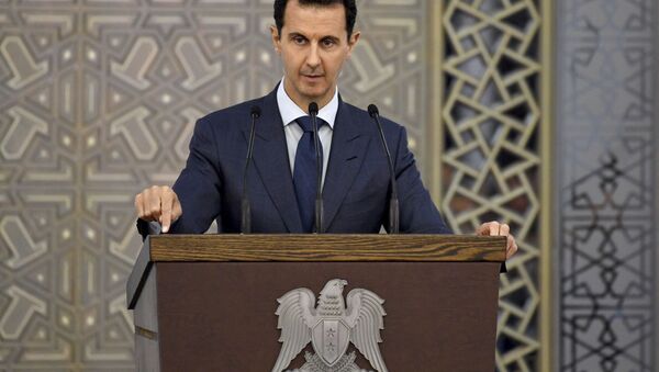 Prezident Sirii Bašar Asad vo vremя vыstupleniя pered diplomatami - Sputnik Srbija