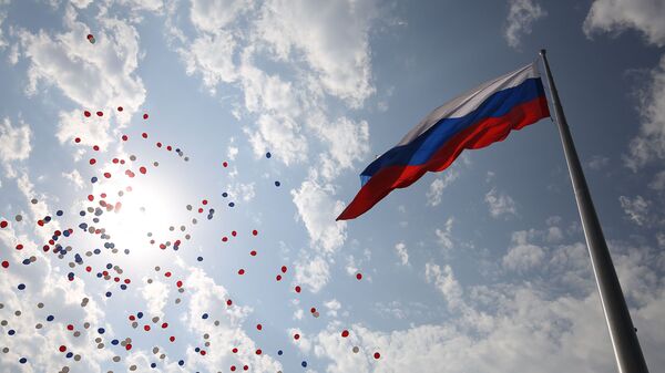 Podizanje zastave na proslavi Dana Nacionalne zastave Ruske Federacije u Krasnodaru. - Sputnik Srbija