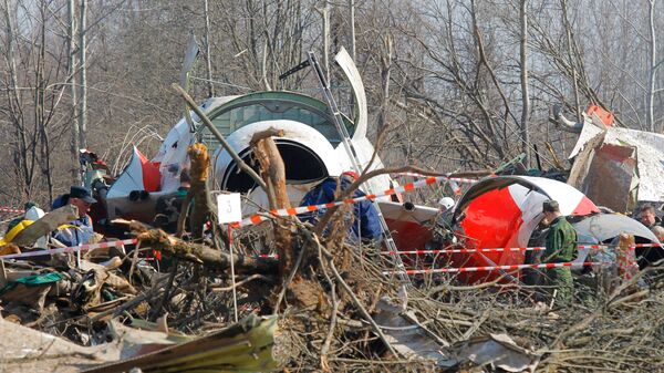 Спасилачке екипе на месту рушења председничког авиона Ту-154 у близини Смоленска - Sputnik Србија