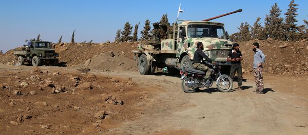 Борци сиријске опозиције у области града Ел Кунејтра Борци сиријске опозиције у области града Ел Кунејтра - Sputnik Србија