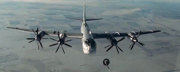 Strateški bombarder Tu-95M tokom raketnog napada krstarećim raketama na objekte terorista u Siriji - Sputnik Srbija