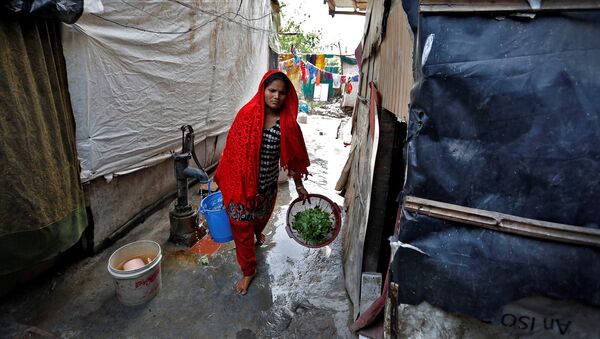 Žena iz naroda Rohindža u izbegličkom kampu u Nju Delhiju - Sputnik Srbija