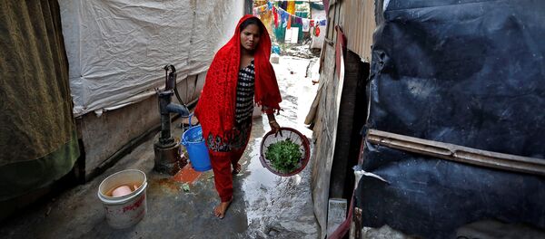 Жена из народа Рохинџа у избегличком кампу у Њу Делхију - Sputnik Србија