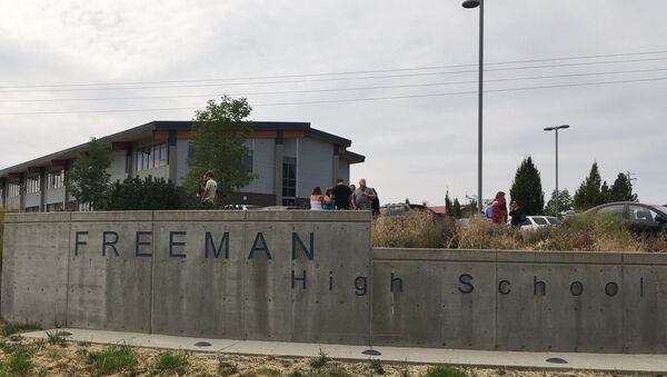 People gather outside of Freeman High School after reports of a shooting at the school in Rockford, Wash., Wednesday, Sept. 13, 2017. - Sputnik Србија