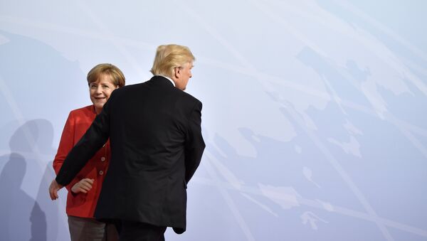 Nemačka kancelarka Angela Merkel i predsednik SAD Donald Tramp na samitu G20 u Hamburgu - Sputnik Srbija