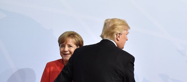 Nemačka kancelarka Angela Merkel i predsednik SAD Donald Tramp na samitu G20 u Hamburgu - Sputnik Srbija