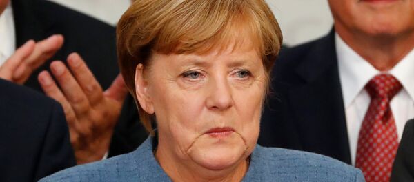 Реакција Ангеле Меркел на резултате избора у Немачкој. Реакција Ангеле Меркел на резултате избора у Немачкој. - Sputnik Србија