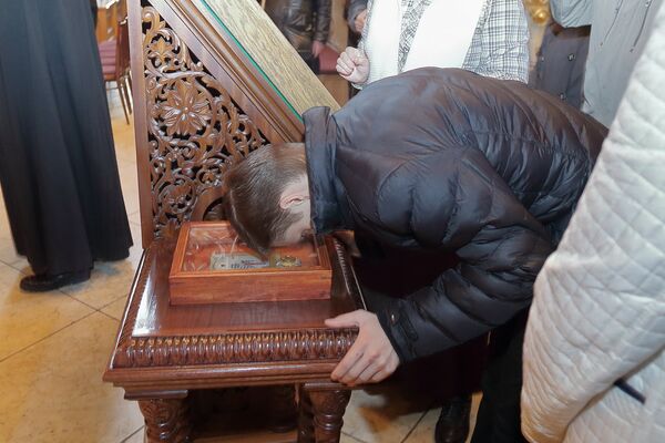 Trojstvena lavra svetog Sergeja dobila je juče delić moštiju prepodobnog Justina Popovića, poznatog bogoslova i propovednika. Trojstvena lavra svetog Sergeja dobila je juče delić moštiju prepodobnog Justina Popovića, poznatog bogoslova i propovednika. - Sputnik Srbija