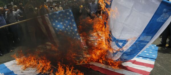 Паљење застава САД и Израела у Ирану - Sputnik Србија