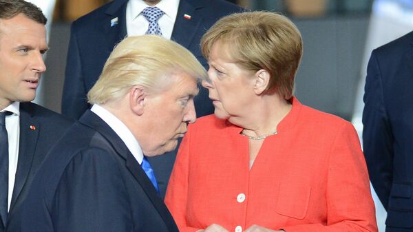 Predsednik Francuske Emanuel Makron, predsednik SAD Donald Tramp i nemačka kancelarka Angela Merkel - Sputnik Srbija