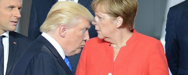 Predsednik Francuske Emanuel Makron, predsednik SAD Donald Tramp i nemačka kancelarka Angela Merkel Predsednik Francuske Emanuel Makron, predsednik SAD Donald Tramp i nemačka kancelarka Angela Merkel - Sputnik Srbija