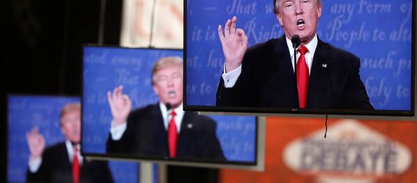 Доналд Трамп на ТВ мониторима Доналд Трамп на ТВ мониторима - Sputnik Србија