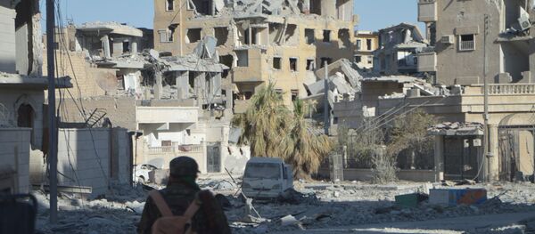 Porušene zgrade u sirijskoj Raki - Sputnik Srbija